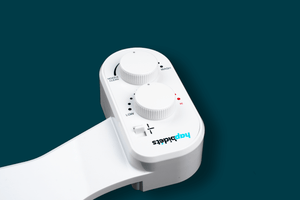 Hapbidets Spark warm water bidet attachment with precision temperature and pressure control dial.